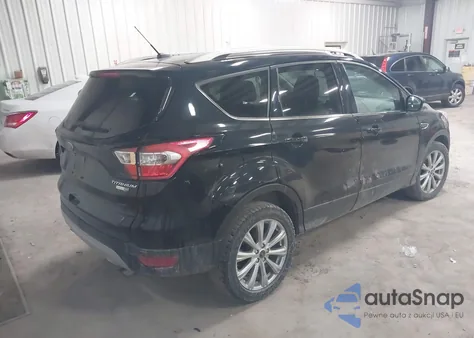2017 Ford Escape Titanium z USA, uszkodzony, nr VIN 1FMCU9JD4HUE32081